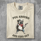 Pug wearing a bandana and cowboy hat holding a pistol.
