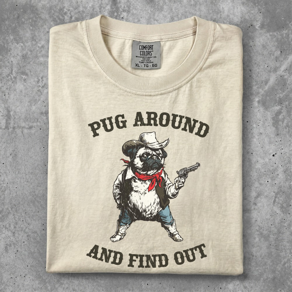 Pug wearing a bandana and cowboy hat holding a pistol.