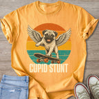A pug with wings on a skateboard reads "Cupid Stunt" on a sunset background.