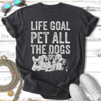 Dark t-shirt with "Life Goal Pet All The Dogs" and illustrations of five dogs.