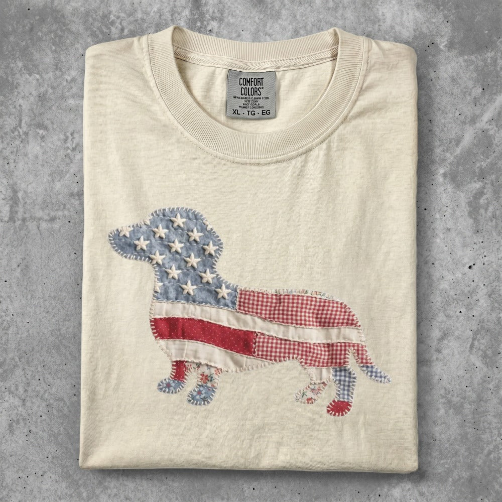 Cream t-shirt with a dachshund silhouette filled with American flag pattern.