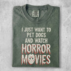 Green t-shirt with "I just want to pet dogs and watch horror movies" text.
