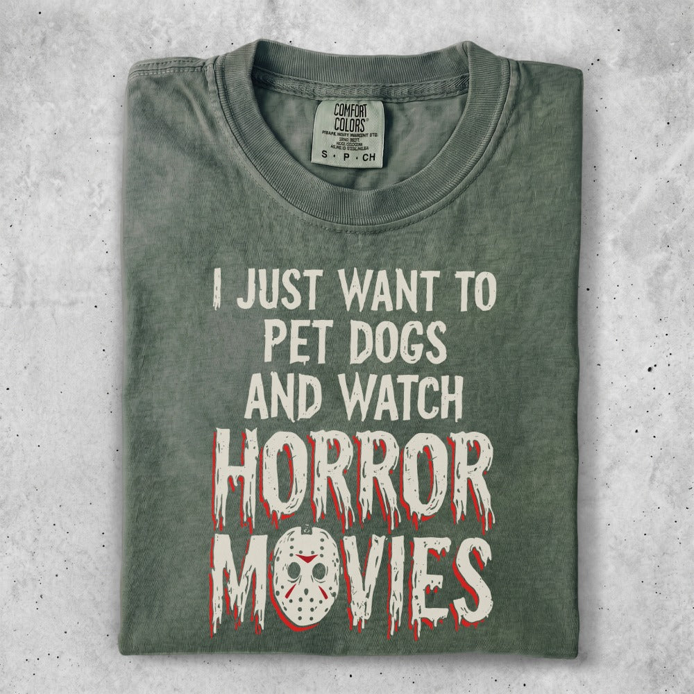 Green t-shirt with "I just want to pet dogs and watch horror movies" text.