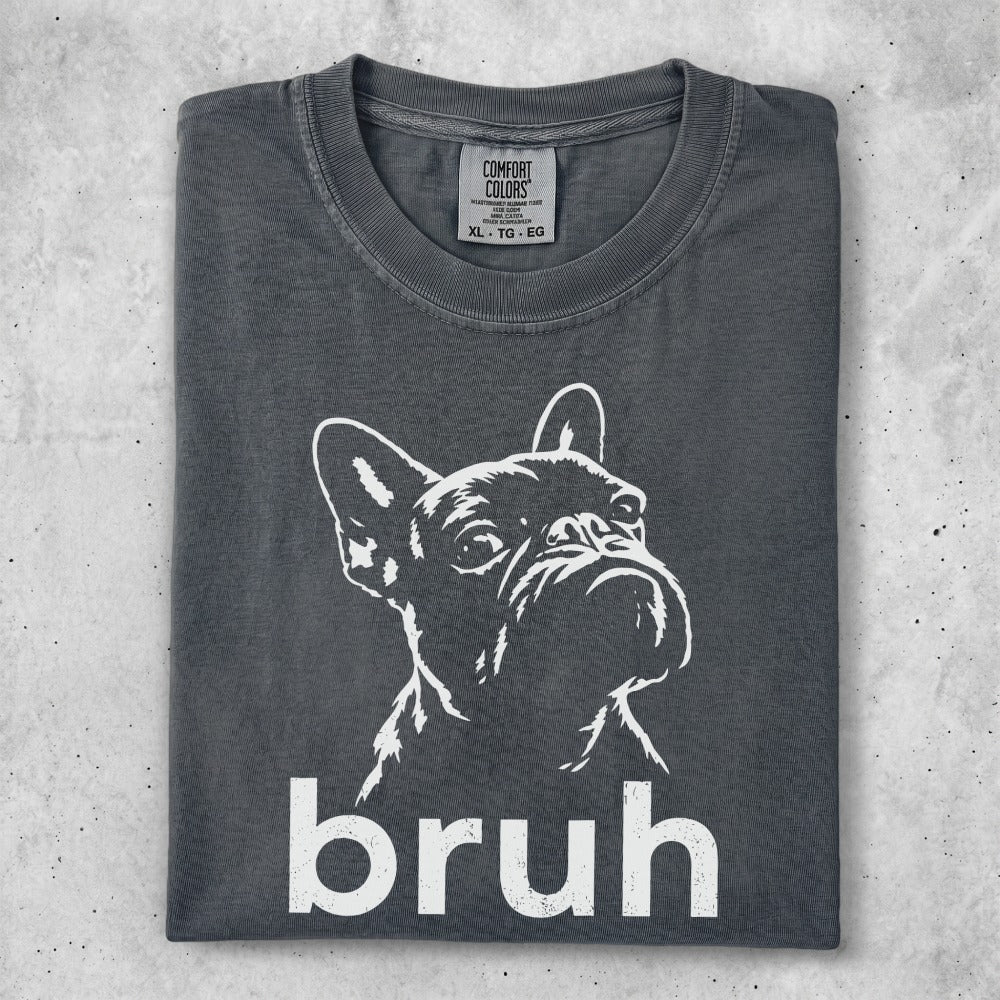 French bulldog graphic on charcoal t-shirt with "bruh" text.