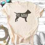 Cream t-shirt with "PIT MOM" graphic in black, featuring a dog silhouette.