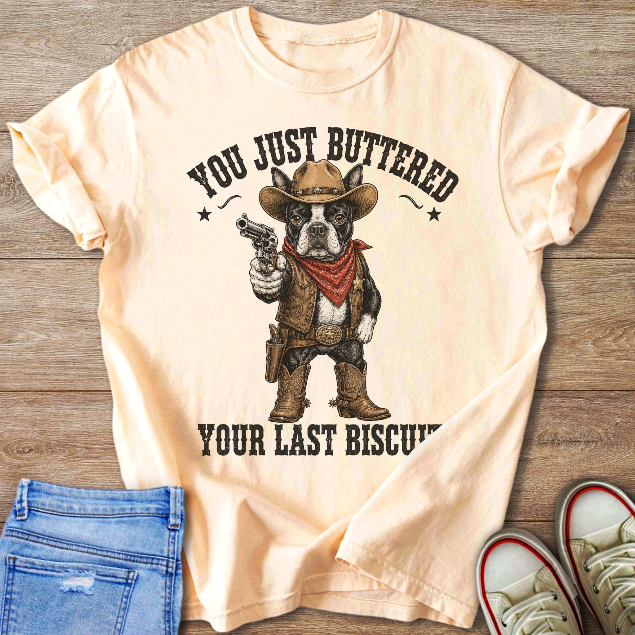 French Bulldog as cowboy holding a gun, text reads "You just buttered your last biscuit".