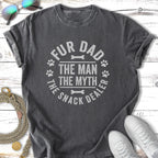 "Fur Dad The Man The Myth The Snack Dealer" graphic t-shirt with paw prints.