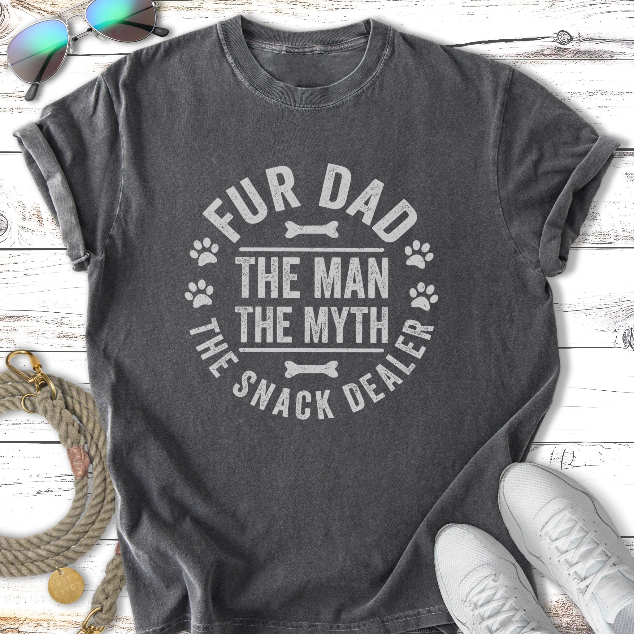 "Fur Dad The Man The Myth The Snack Dealer" graphic t-shirt with paw prints.