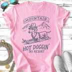 Pink t-shirt with dachshund in sunglasses on skis, "Mountain Hot Doggin' Ski Resort" text.