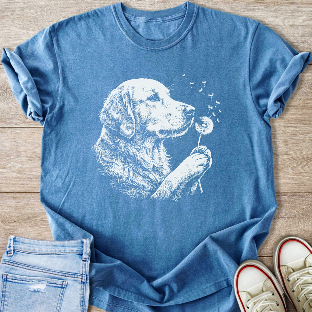 Blue t-shirt with white drawing of dog blowing dandelion seeds