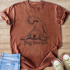 Brown t-shirt with a sketched dog and "Big Stretch" text.