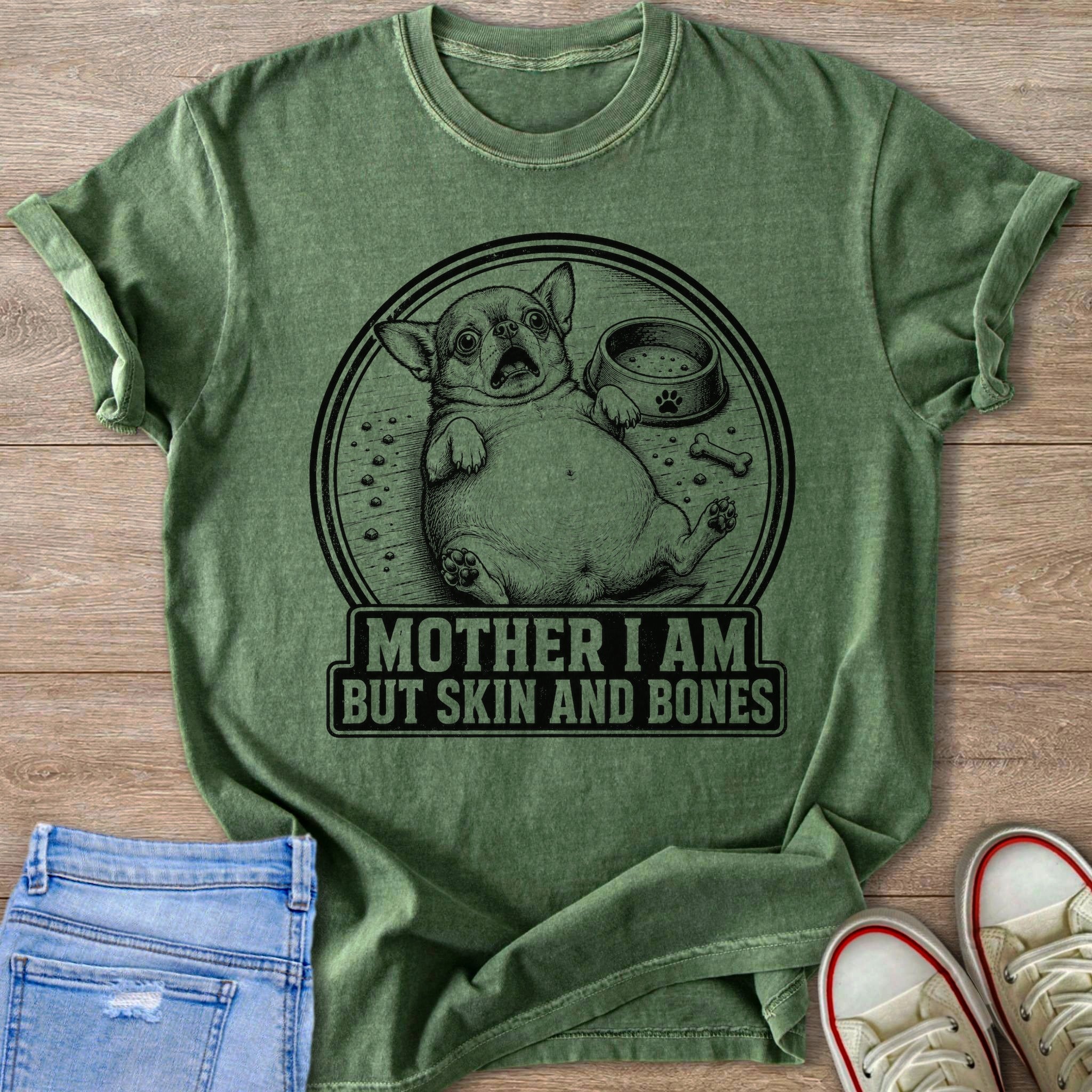 Chihuahua graphic with text "MOTHER I AM BUT SKIN AND BONES" on a green t-shirt.