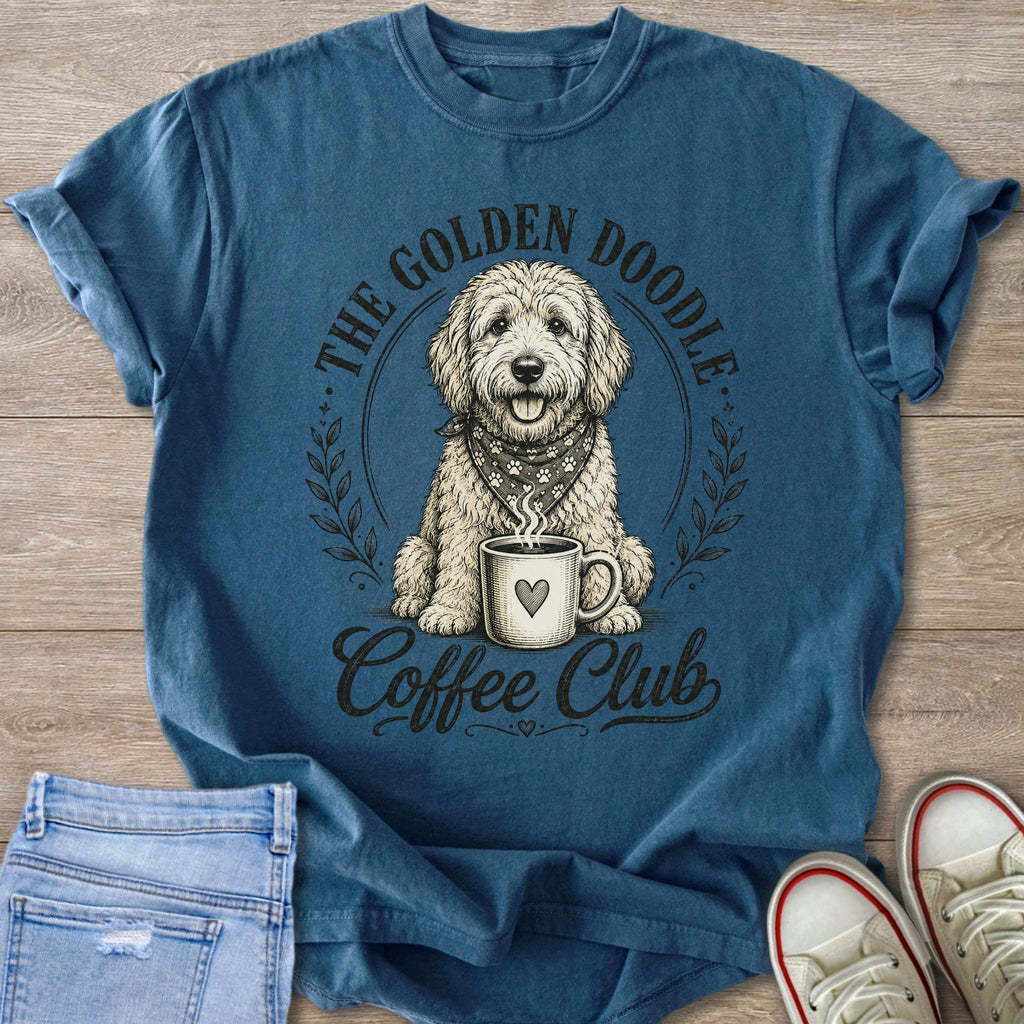 Blue t-shirt with a drawing of a golden doodle and the text "The Golden Doodle Coffee Club".