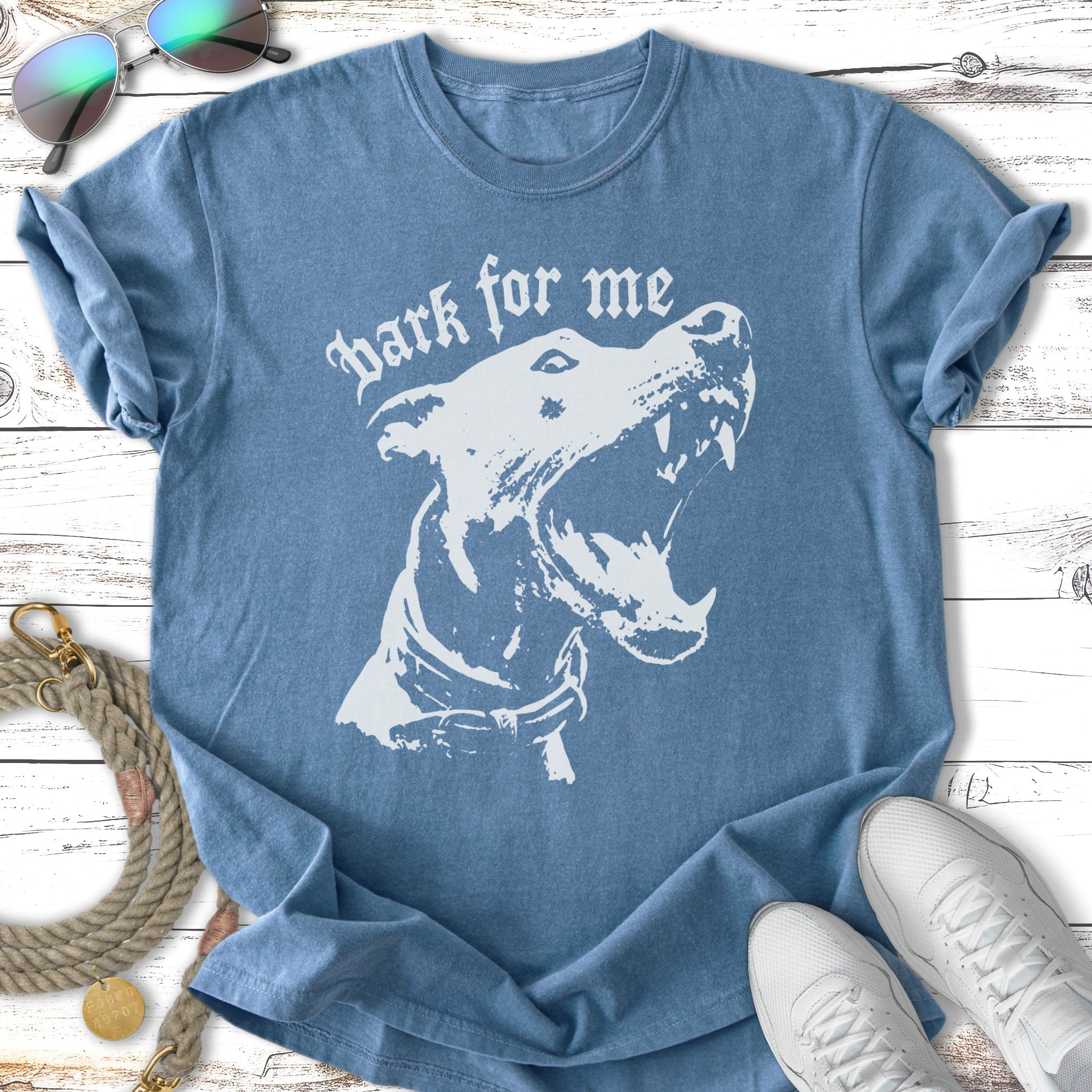 Blue t-shirt with white graphic of a snarling dog and "Bark for me" text.