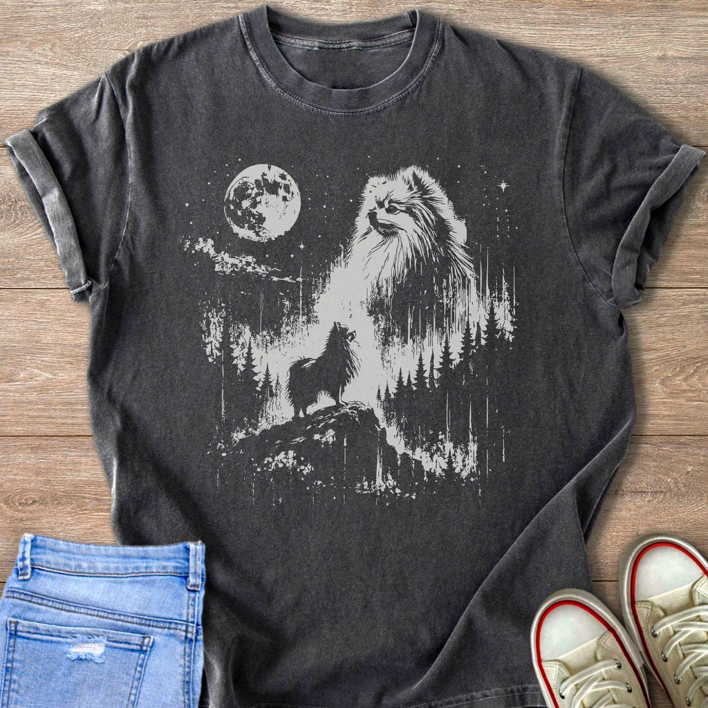 Dark t-shirt with graphic of a Pomeranian howling at the moon in a forest.