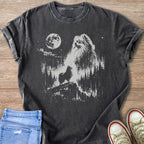 Dark t-shirt with graphic of a Pomeranian howling at the moon in a forest.