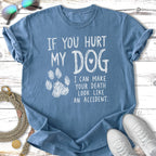 Blue t-shirt with "If you hurt my dog, I can make your death look like an accident" text.
