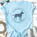 Light blue t-shirt with black graphic of a dog and text "All food must go to the lab for testing."