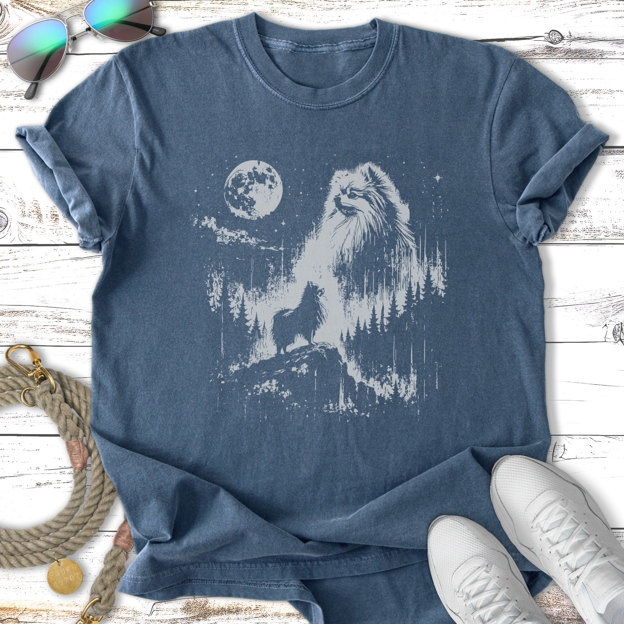 Dark blue t-shirt with a distressed graphic of a Pomeranian silhouette against a forest and moon.