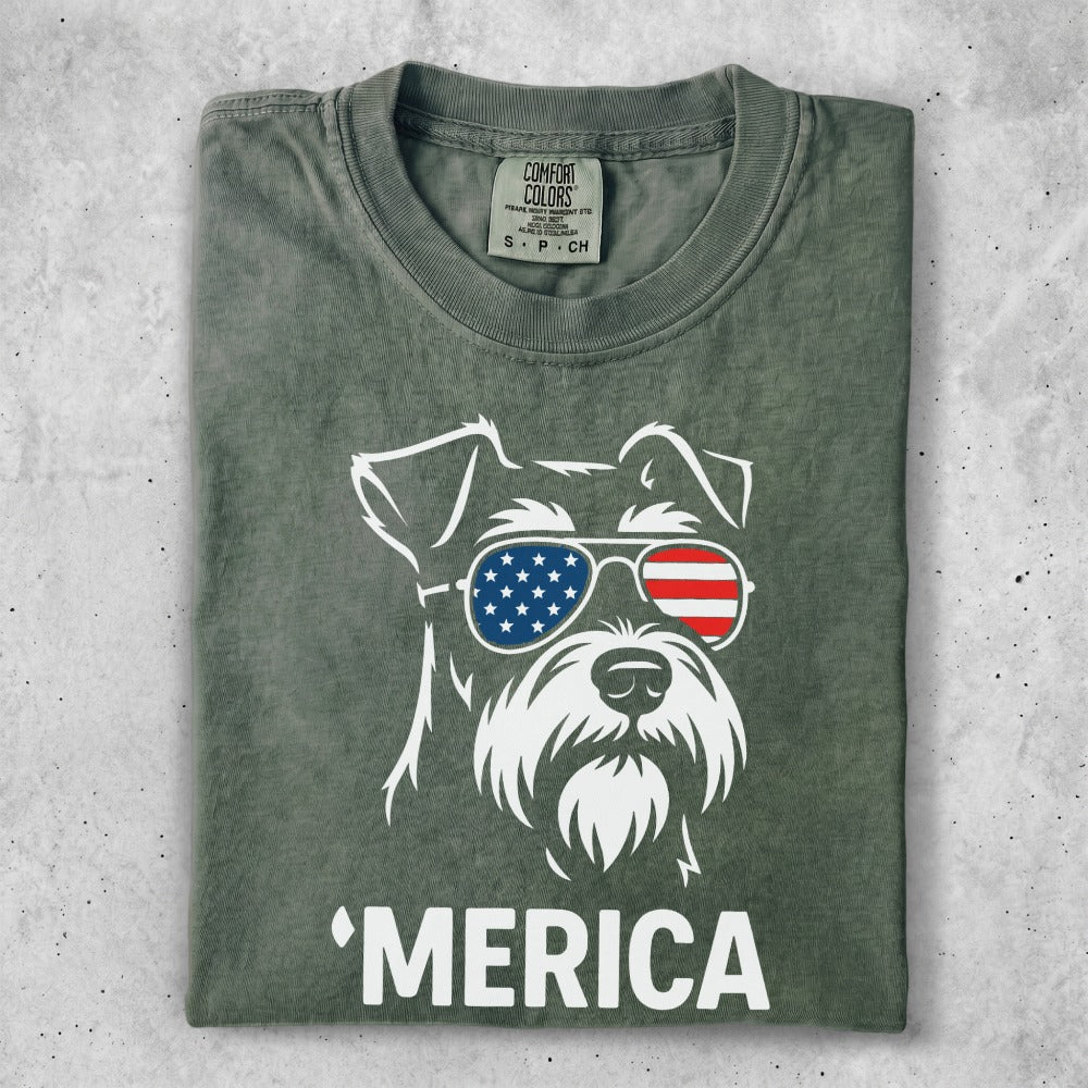 Green t-shirt with a schnauzer wearing American flag sunglasses and "MERICA".
