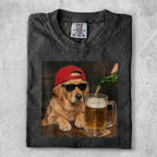 Golden retriever wearing sunglasses and red hat pours beer into mug.