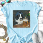 Border collie dog wearing a baseball cap pours beer into a mug.