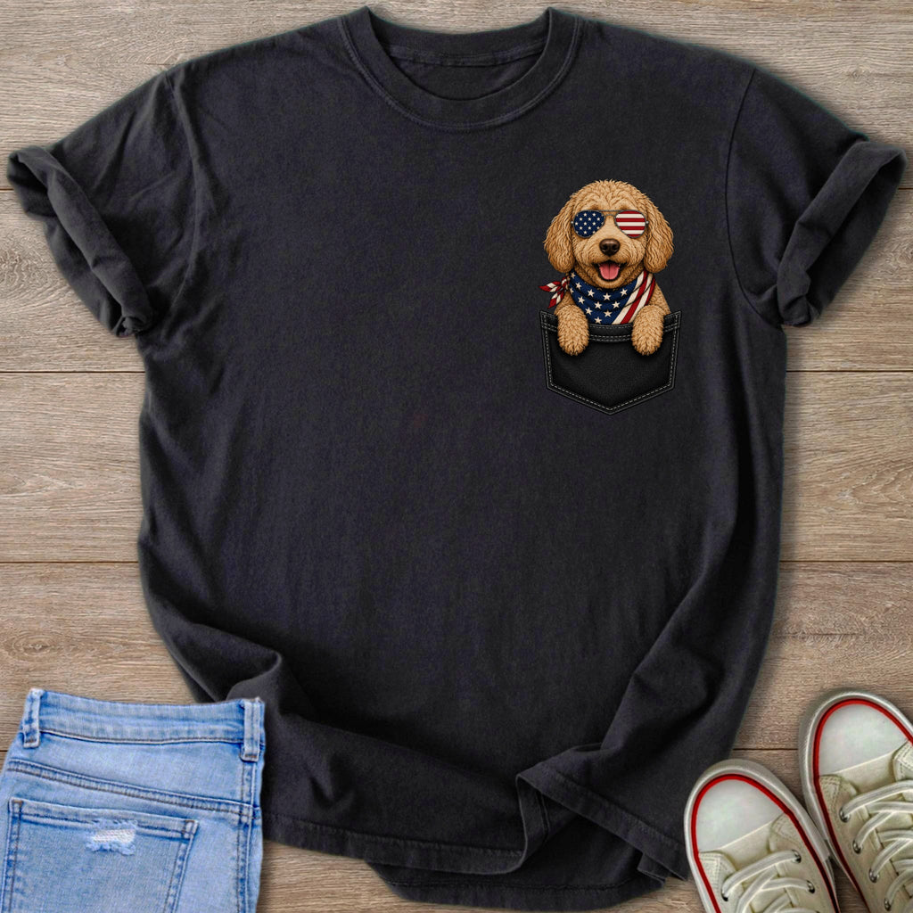 Black t-shirt with a dog wearing American flag bandana and sunglasses in its pocket.