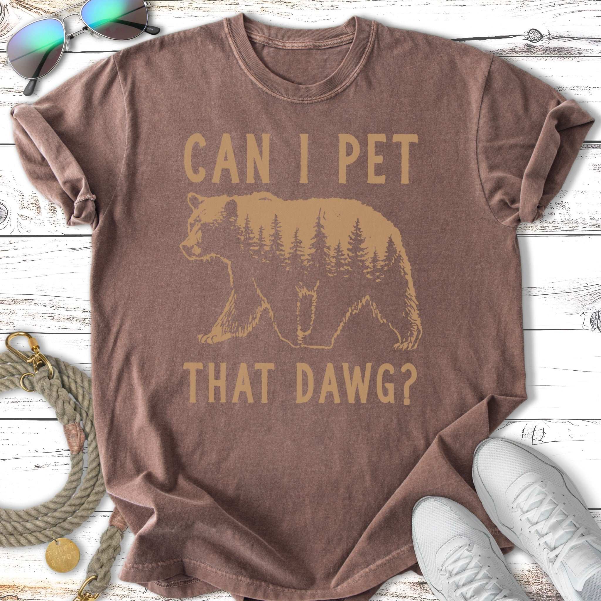 Brown t-shirt with a bear and forest graphic and text "CAN I PET THAT DAWG?".