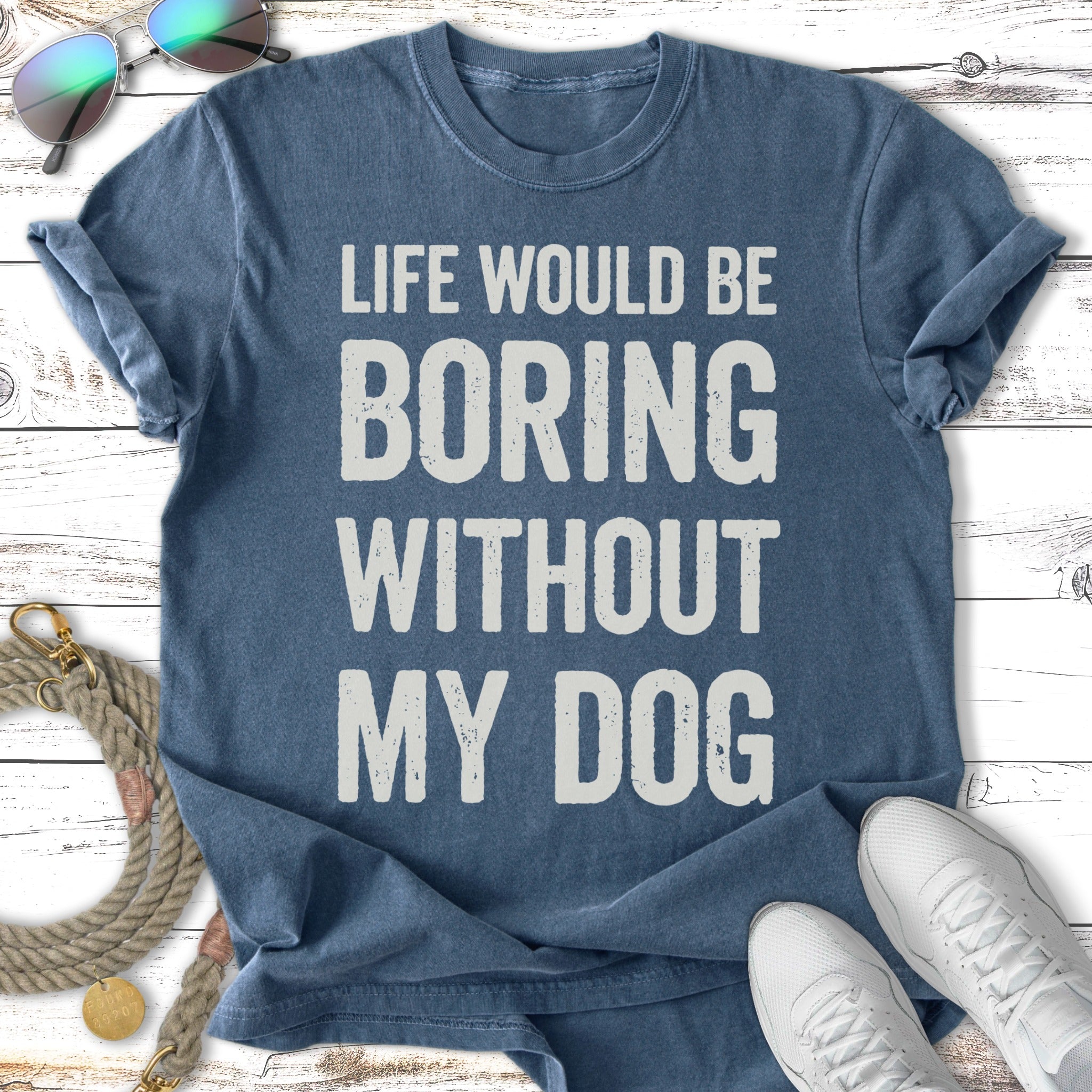 T-shirt with "Life would be boring without my dog" text, with sunglasses and sneakers.