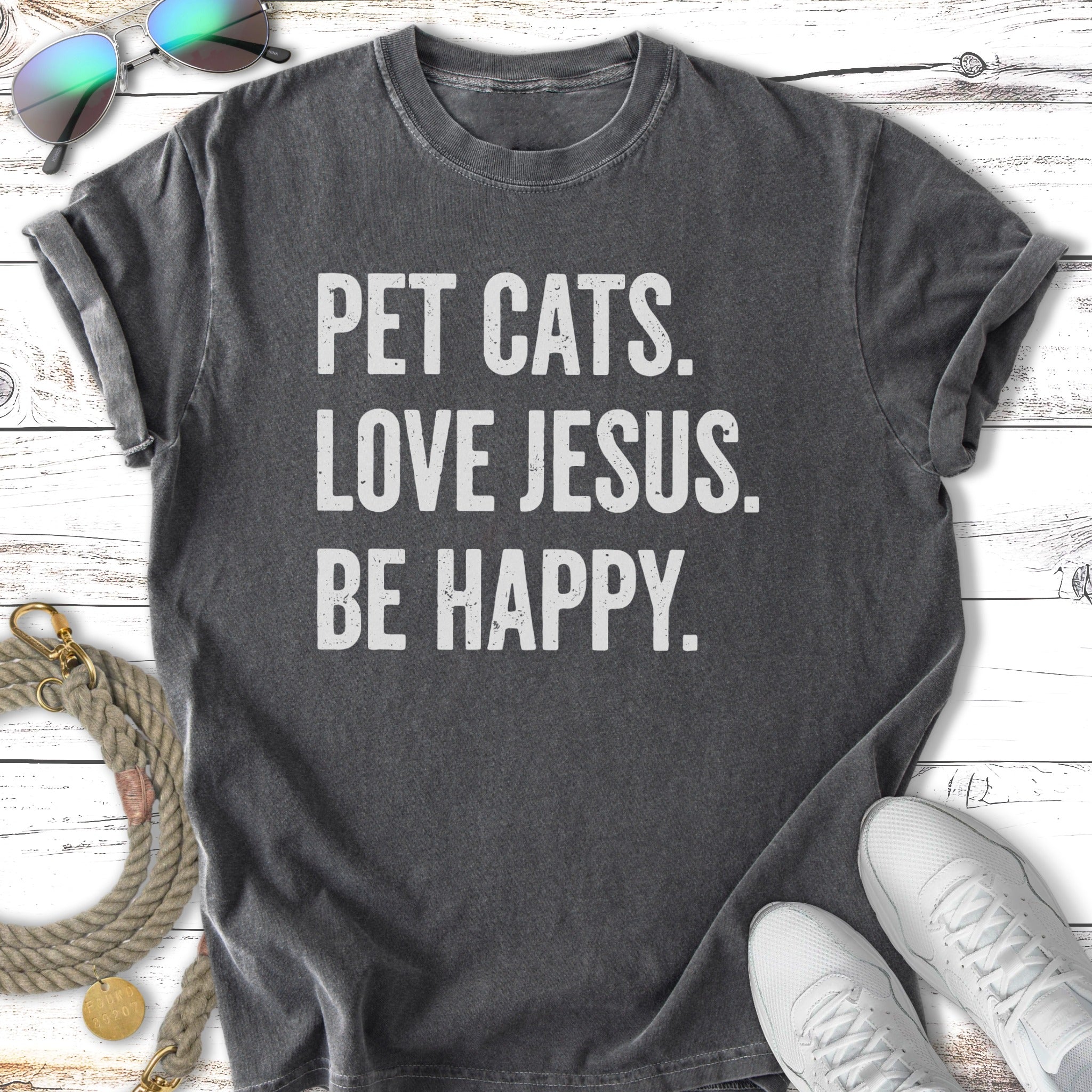Dark gray t-shirt with "PET CATS. LOVE JESUS. BE HAPPY." text.