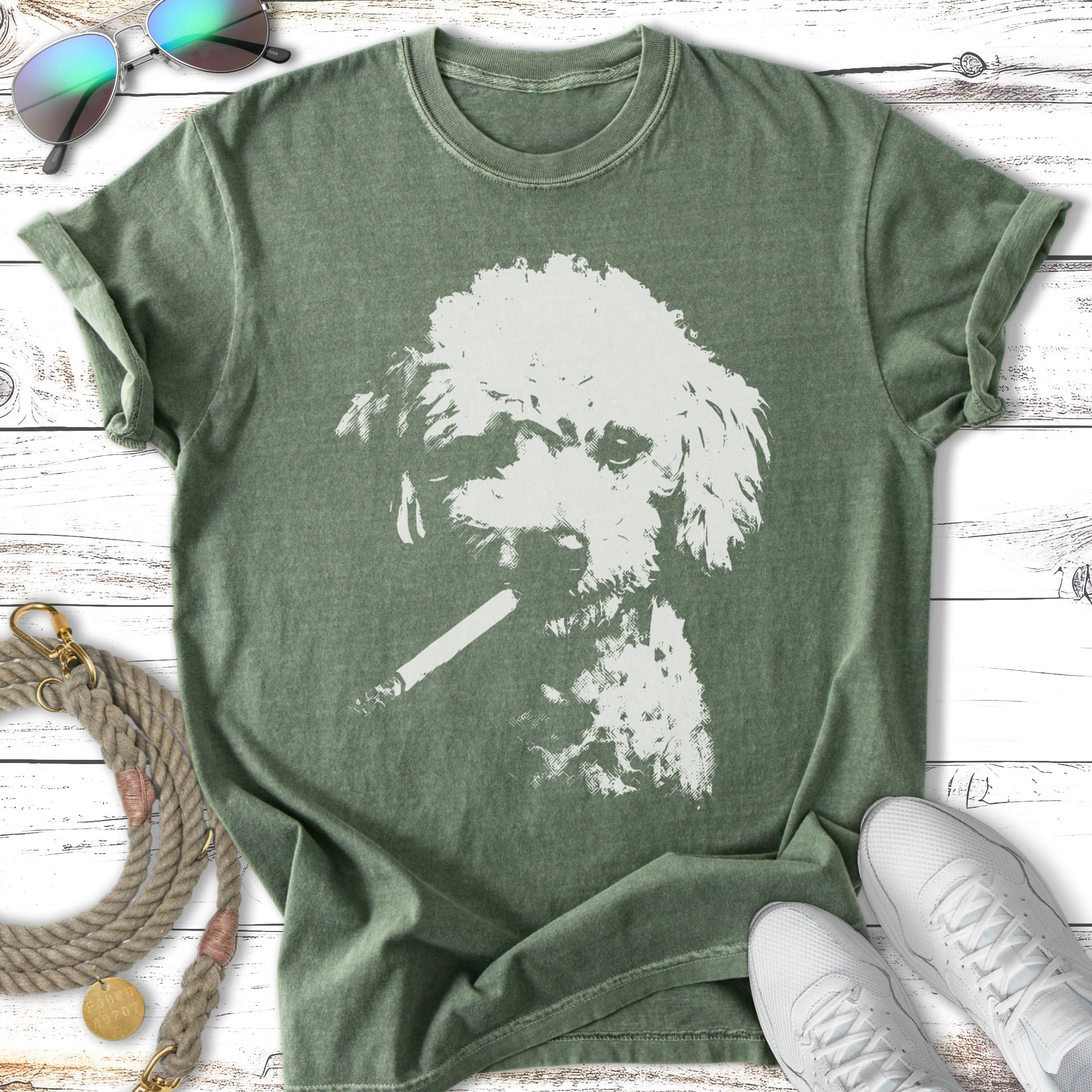 T-shirt with a white poodle graphic smoking a cigar.