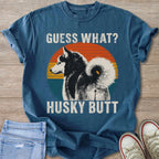 Blue t-shirt with "Guess What? Husky Butt" text and a husky dog illustration.