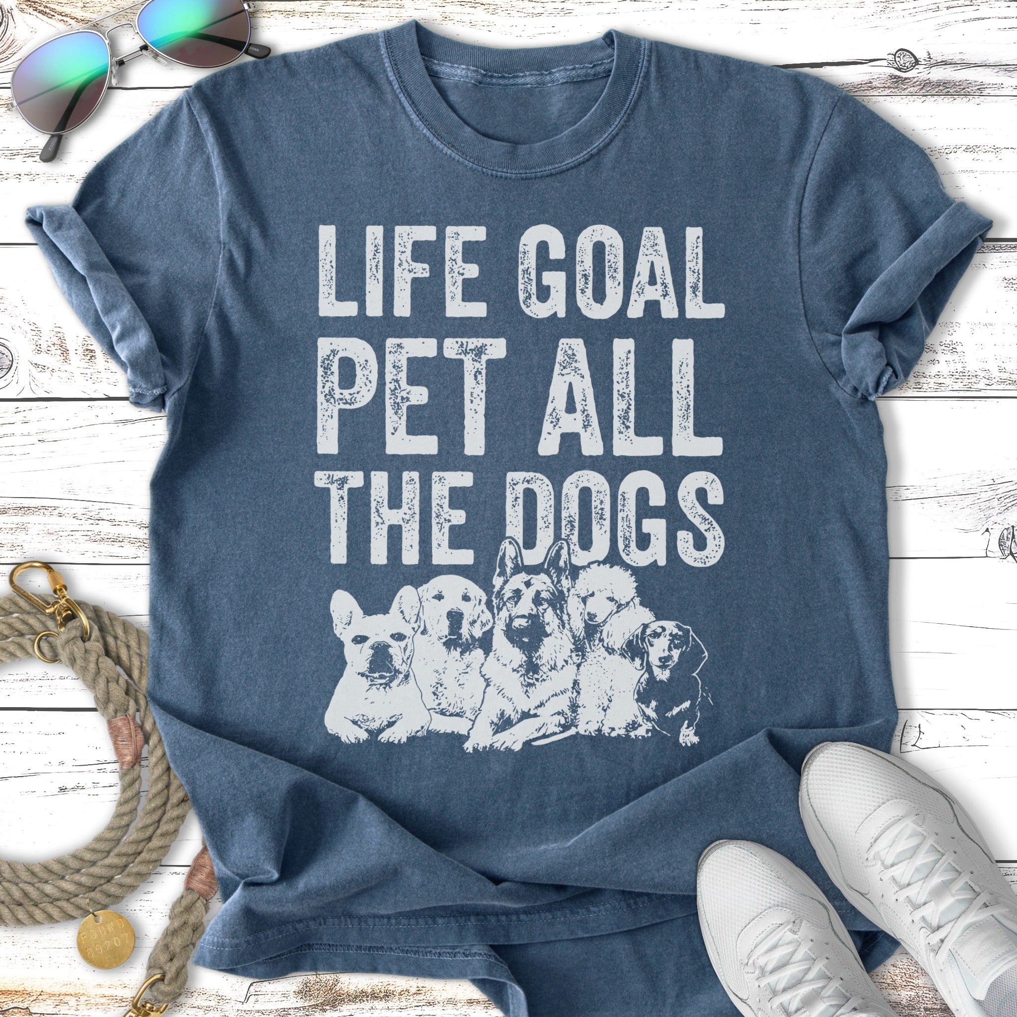 T-shirt with dogs and "Life Goal Pet All The Dogs" text.