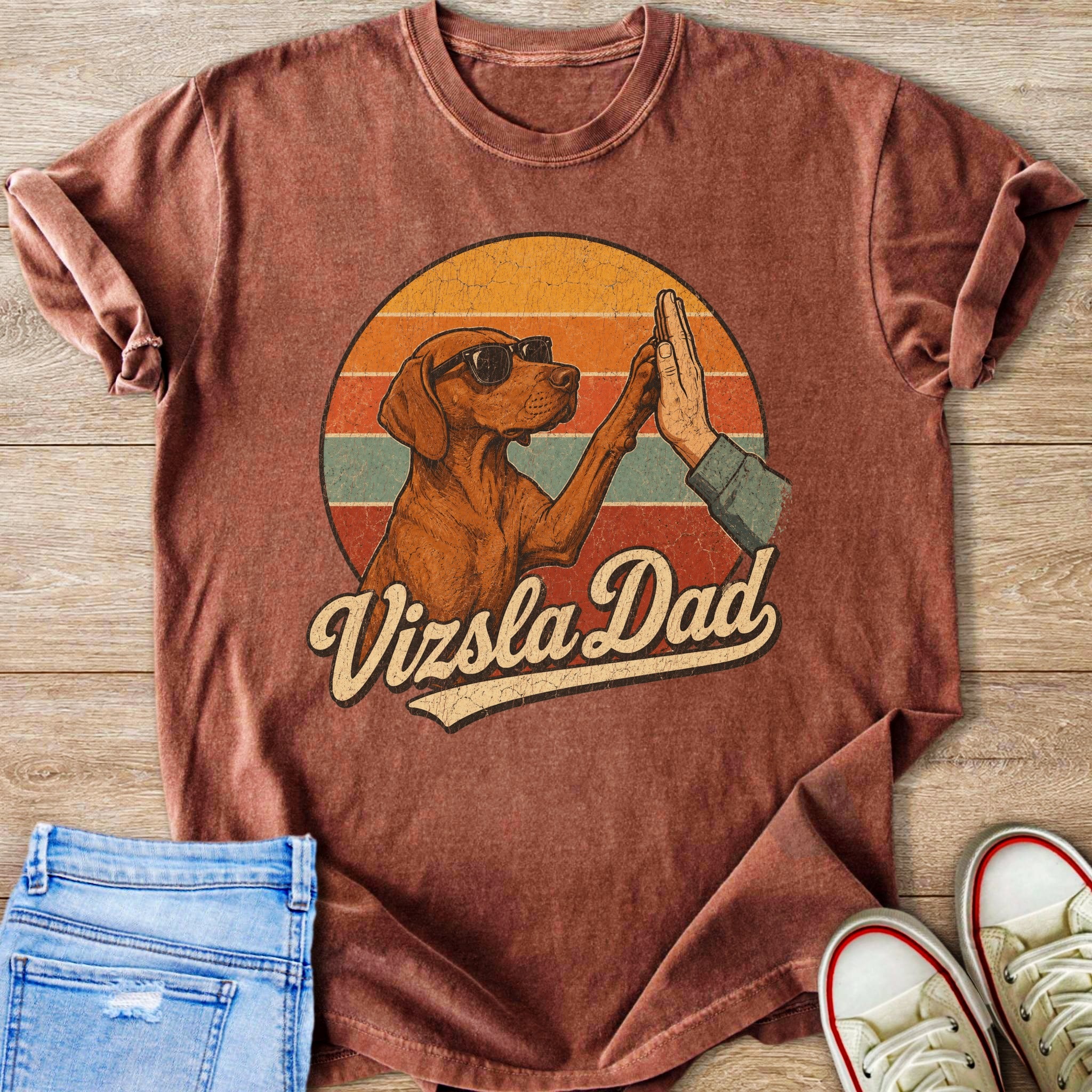 Vizsla dog wearing sunglasses gives a high-five with text "Vizsla Dad".