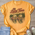 Yellow t-shirt with two golden retrievers in life vests and text "It's Lake Time".