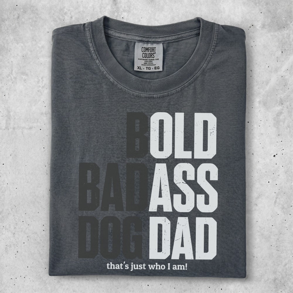 Charcoal t-shirt with "BOLD BADASS DOG DAD that's just who I am!" text.