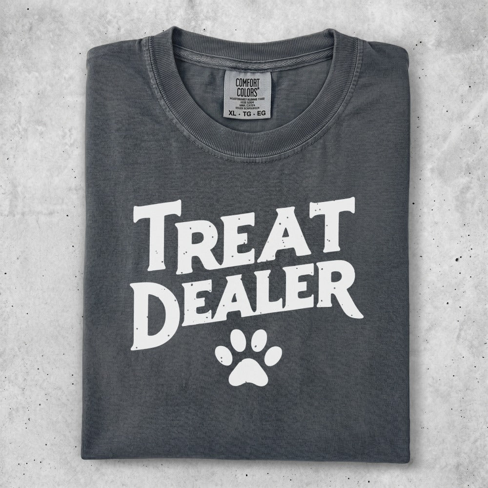 Gray t-shirt with "Treat Dealer" and paw print graphic.