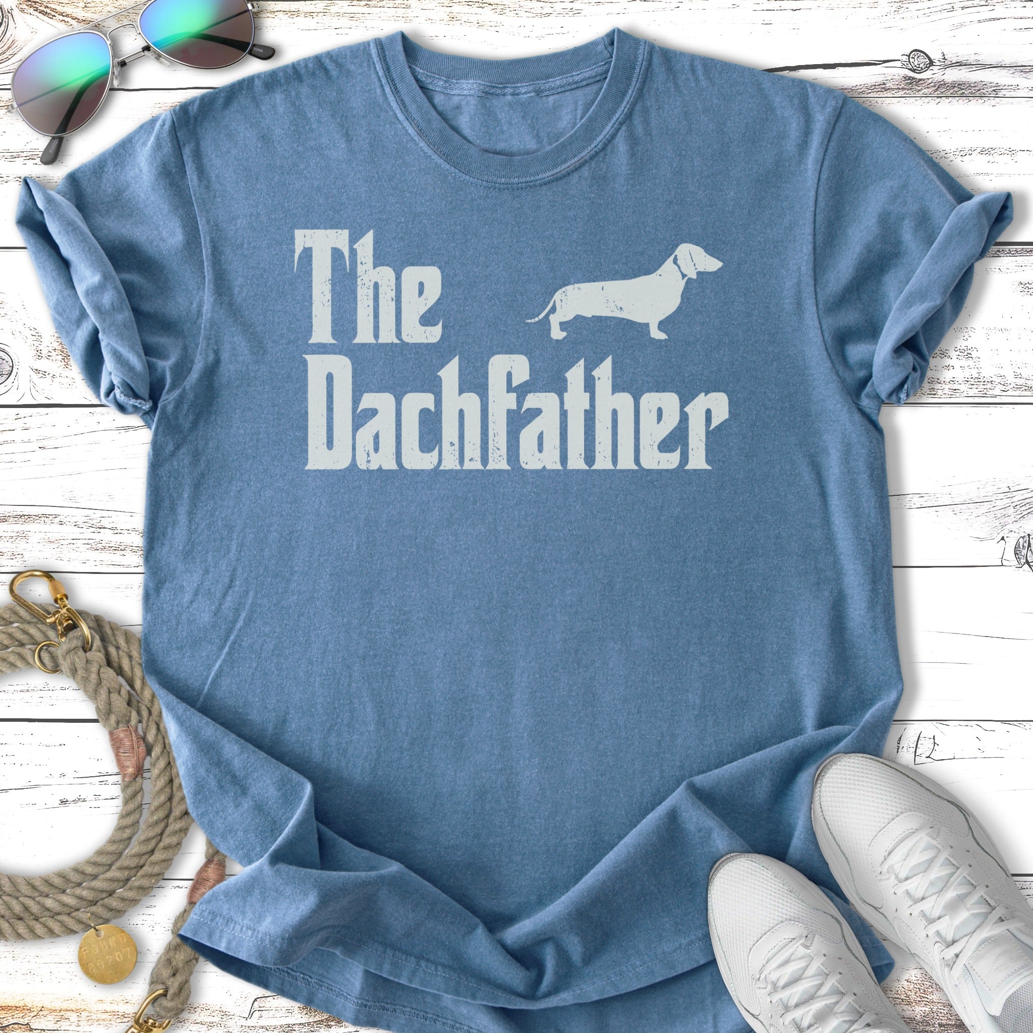 Blue t-shirt with "The DachFather" and a dachshund silhouette.