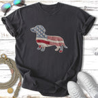 Dachshund silhouette with American flag and plaid patchwork on charcoal t-shirt.
