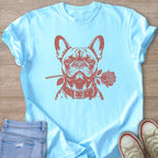 Light blue t-shirt with a brown French Bulldog graphic holding a rose in its mouth.